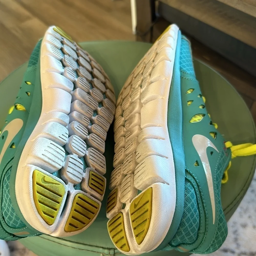 Nike running shoes, aqua blue, yellow, white size 9.5